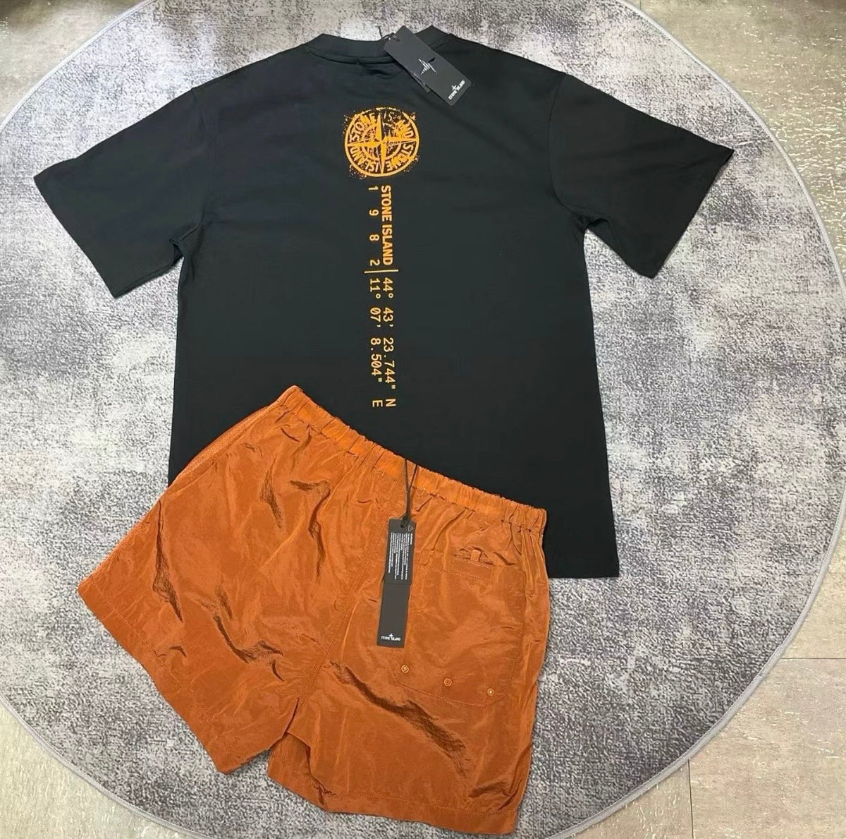 Ensemble stone island orange et noir